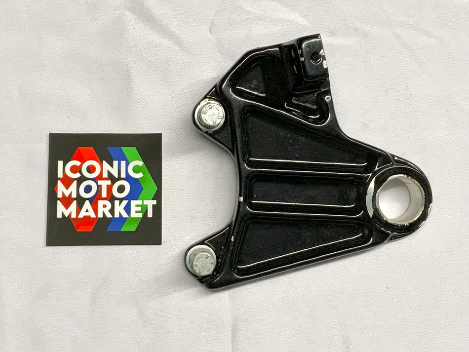 Ducati 750 Indiana (1986). Left-side Rear Set / Brake Plate. New-in-Package. (OEM) #036140100