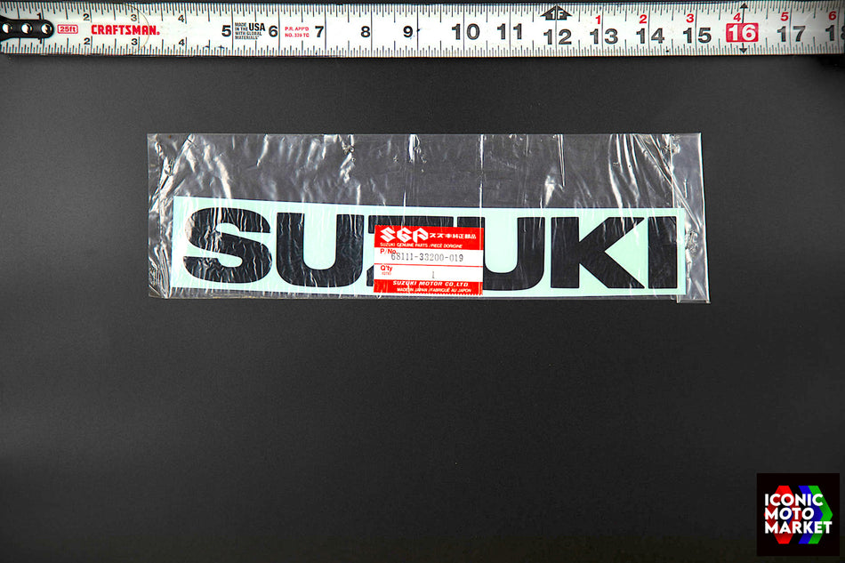 Suzuki RG500, GSX-R750, GS500E - 'Suzuki' Emblem Black, Fairing Decal. NOS (OEM) #68111-33200-019