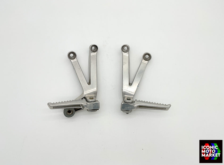 Honda CBR900RR Fireblade (2002-2003) Passenger Footpegs, Set. (OEM) #50750MCJ750_50760MCJ750