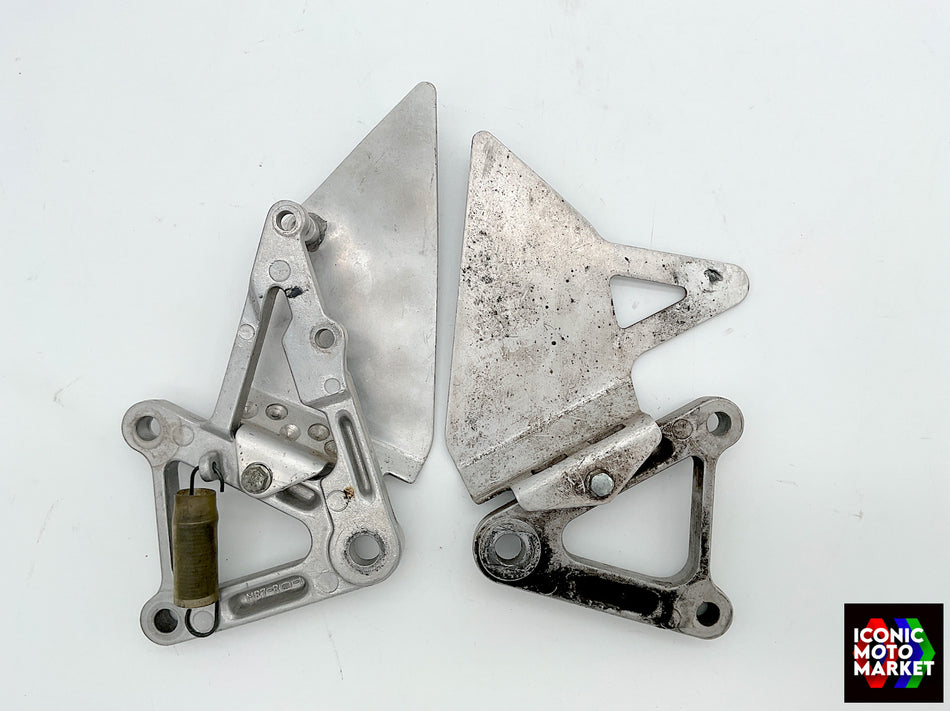 Honda VFR750R RC30 (1987-1990) Footpeg Bracket Set w/ Heel Guards. (OEM) #50600MR7000_50700MR7000(2)
